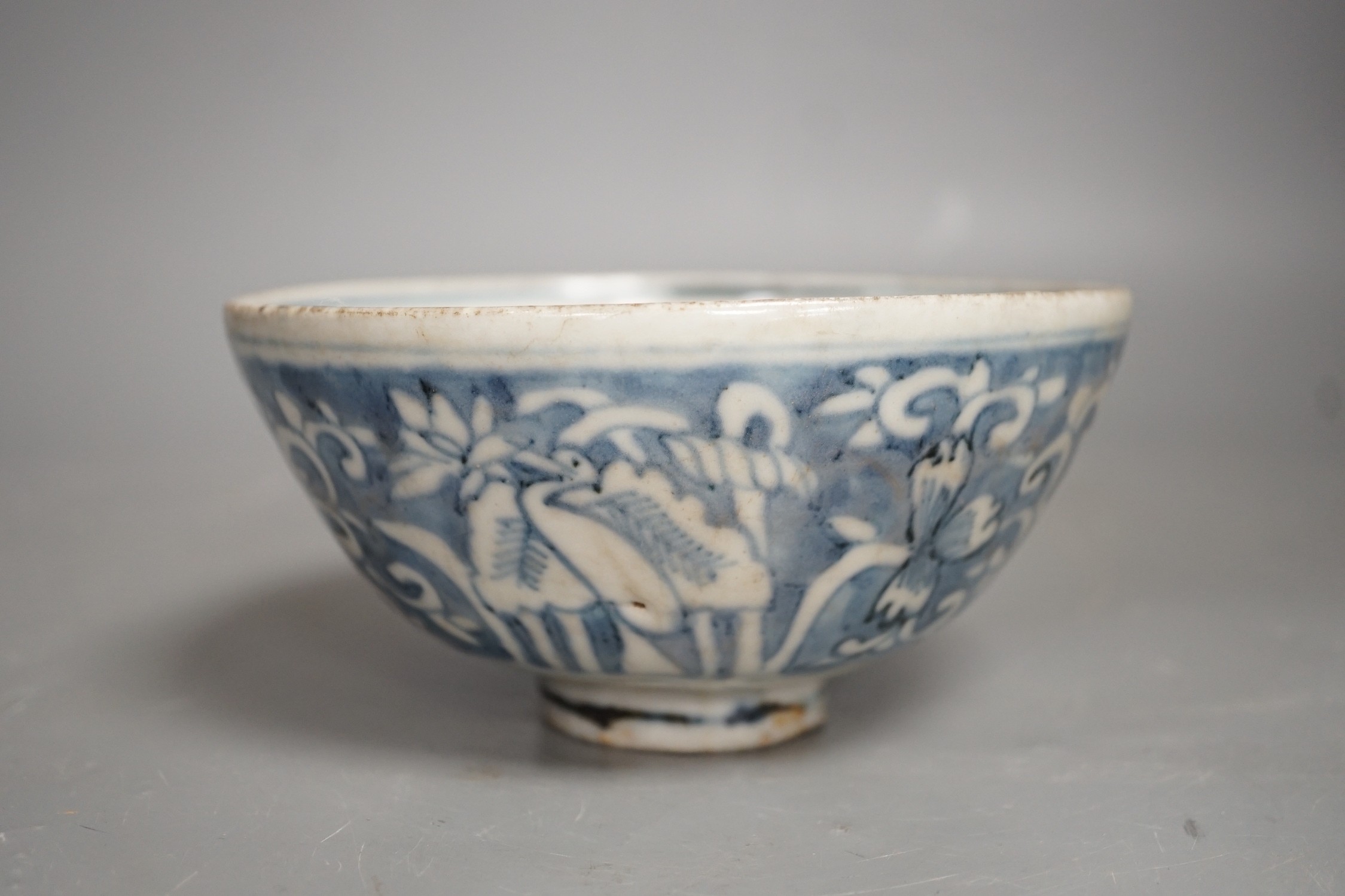 A Chinese late Ming blue and white ‘egret and Lotus’ bowl, Zhangzhou kilns, 14.7cm